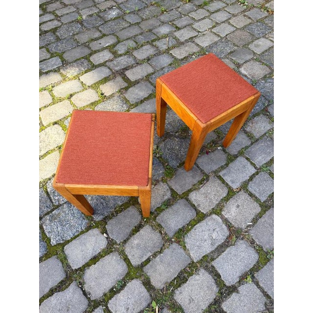 A compact Scandinavian all-rounder with colorful charm: This Danish stool made of solid oak impresses with its clean,...