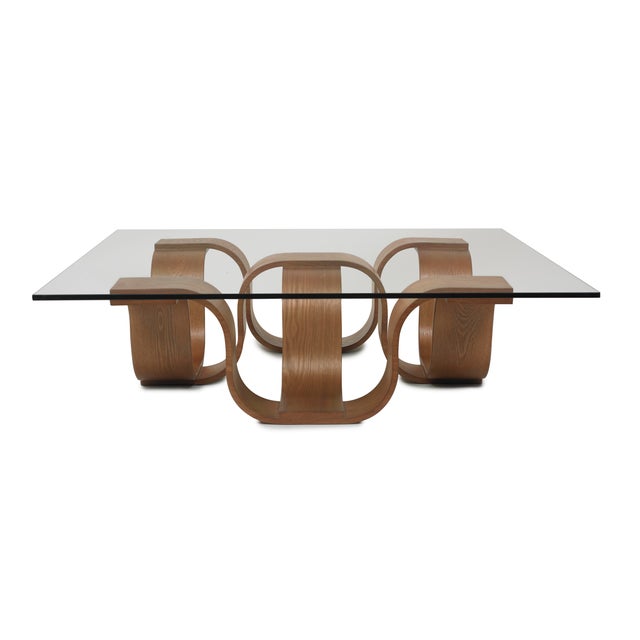 Designed by Vito Selma for Oggetti, the Square Coffee Table synthesizes clean geometric lines with soft, fluid contours....