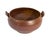 A studio pottery bowl with handle. Unsigned, this bowl exhibits a wide body which curves in to the base. The bowl's glaze...