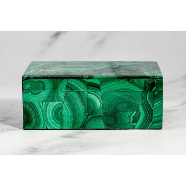 A captivating celebration of natural beauty and European craftsmanship, this exquisite vintage malachite box is a striking...
