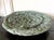 A substantial stoneware vessel thickly coil-built by hand in a concave plate form by Japanese contemporary ceramist Satoru...