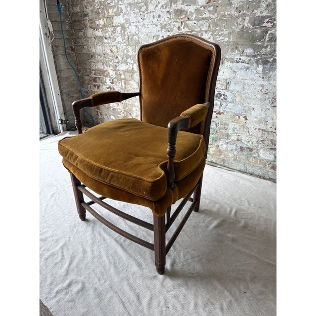 A beautifully timeworn 19th century American armchair with exceptional presence and rich character, sourced from the...