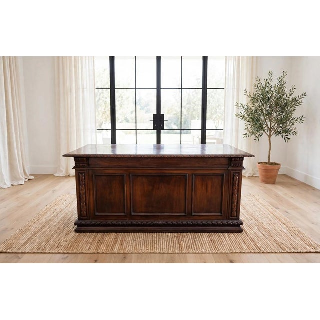 Late 19th-century Empire-style countertop desk in hand-carved and finished dark walnut Double pedestal chest and two...