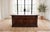 Late 19th-century Empire-style countertop desk in hand-carved and finished dark walnut Double pedestal chest and two...