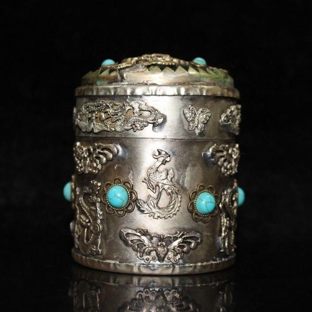 Elevate your tea ritual with this stunning vintage tea caddy. Crafted from copper with a silver-plated finish, this...