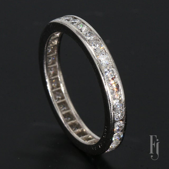 Early 21st Century 14k White Gold Diamond Channel Set Eternity Wedding Band - Size 5.5 For Sale - Image 5 of 6