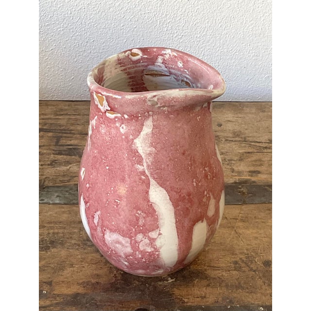 This original studio art pottery vase is a soulful expression of late mid-century artisanal craft, featuring a unique,...