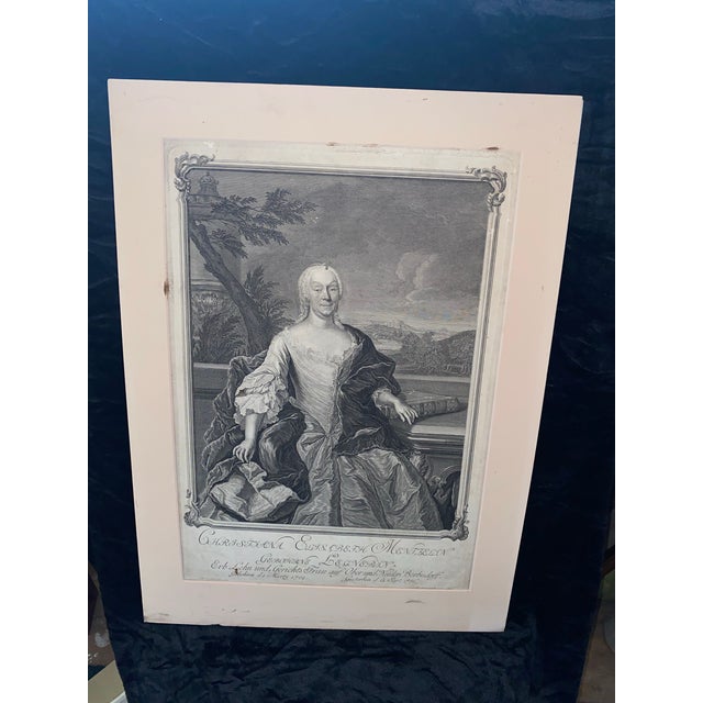 This engraving depicts Christiana Elisabeth Mentzelin, born Legnerin, who held the title of "Erb Lehn und Gerichts Frau...