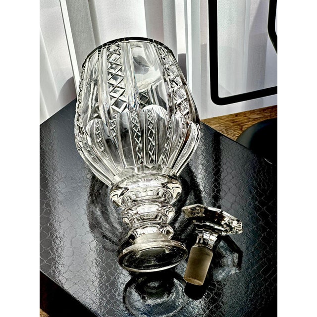 A finely proportioned pair of Victorian cut crystal decanters, dating to the mid–late 19th century. Each decanter features...