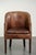 his comfortable occasional/desk chair in characterful cognac-colored cowhide leather with a beautiful patina is finished...