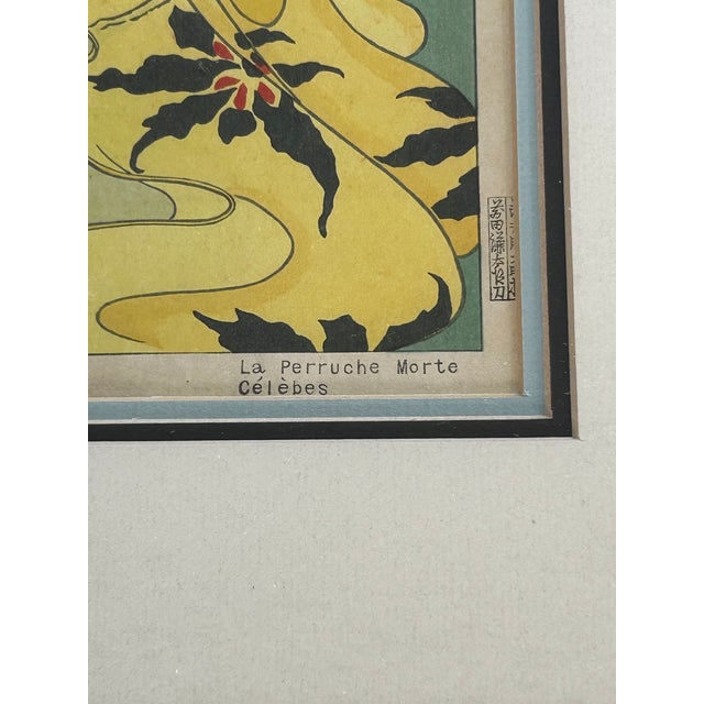 A Japanese Woodblock print by Paul Jacoulet (French, 1896-1960) entitled La Perruche Mortes. Celebes Created in 1948, this...