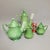 A luminous four-piece English ironstone service in Johnson Brothers’ sculptural “Jade Green” glaze. The set includes a...