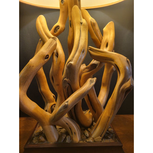 Striking large-scale mid-century table lamp, circa 1950s–1960s, composed of sinuously intertwined natural driftwood...