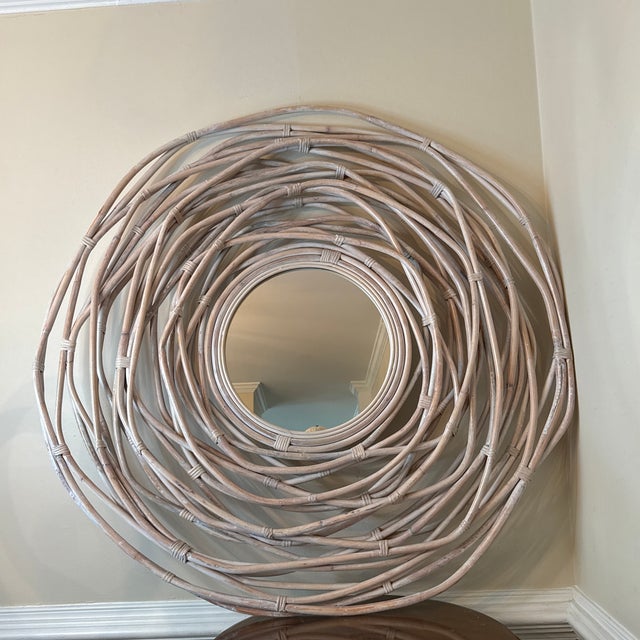Make a statement in any room with this large boho rattan wall mirror, featuring a stunning spiral woven frame in a light...