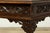 Dating to the late 19th century, this French Gothic Revival writing desk is crafted from solid oak and distinguished by...