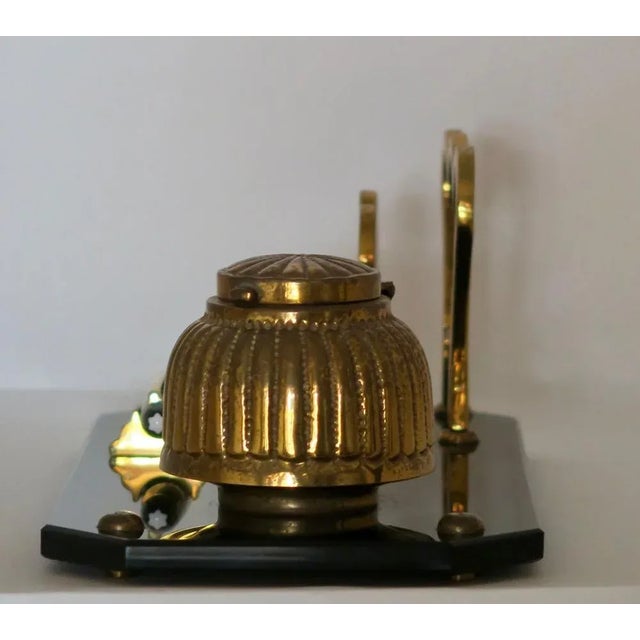 Spectacular Art Deco inkwell. Base in black opaline. Porcelain ink bowl. Gold leaf finish decor on functional elements....