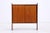Beautiful vintage teak chest of drawers with sliding doors from the 1960s, featuring a clean, compact design and a calm,...