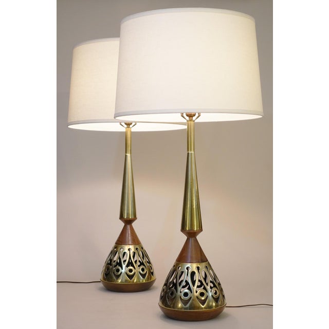 DESIGN: A rare and striking X large matched pair of vintage Atomic Modern Brass & Walnut stylized "Genie Bottle" shaped...