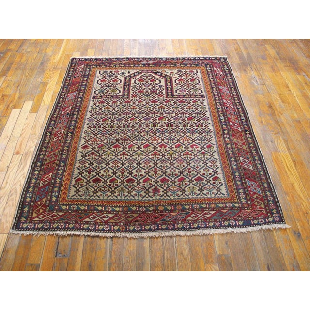 Antique Caucasian rug, measures: 4'0" x 5'0". Antique Caucasian Caucasian Ivory 1880s Rug, Circa Date: 1880s. This...
