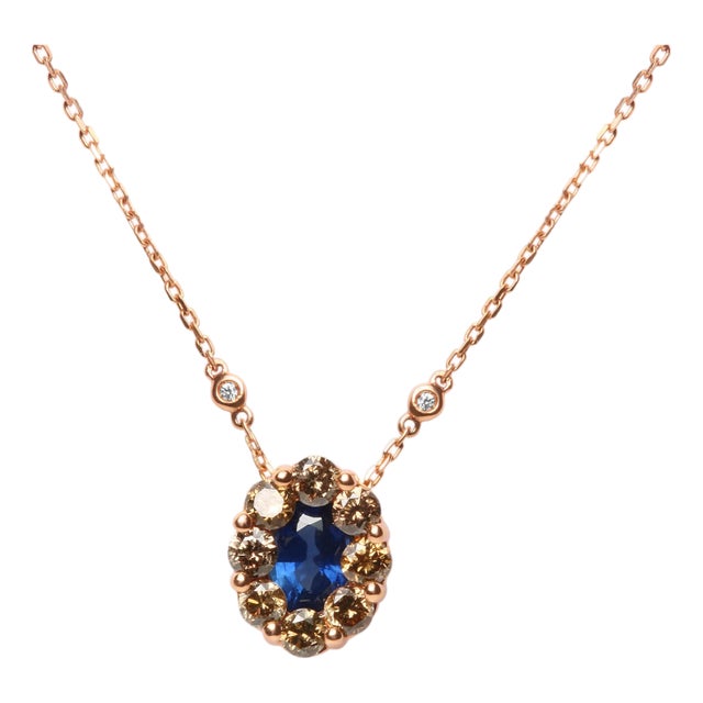 18K Rose Gold 5/8 Cttw White and Brown Diamond Accent and 7 x 4mm Oval Blue Sapphire Gemstone Statement Halo Cluster Pendant Necklace For Sale