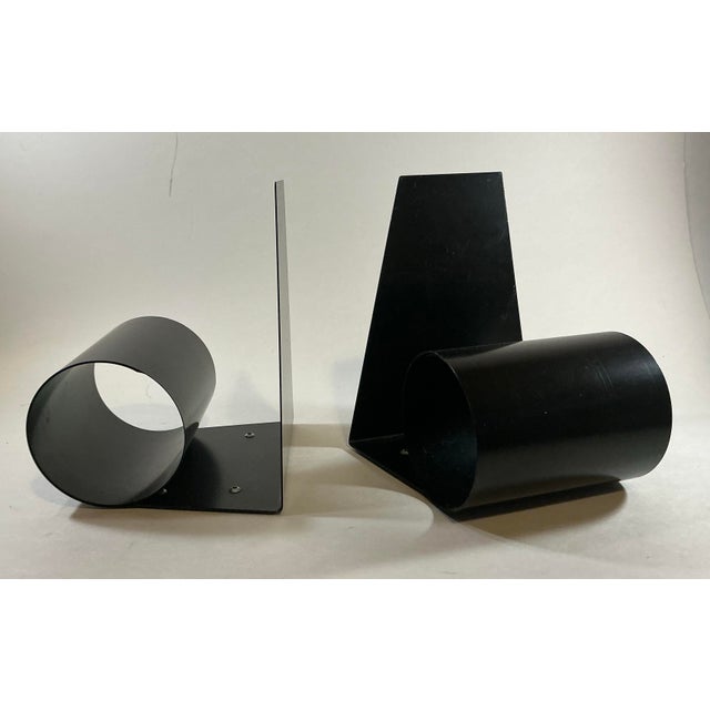 Elevate your shelving or desktop with this exceptional collection of original 1960s “Bookworm” spring-loaded coil...