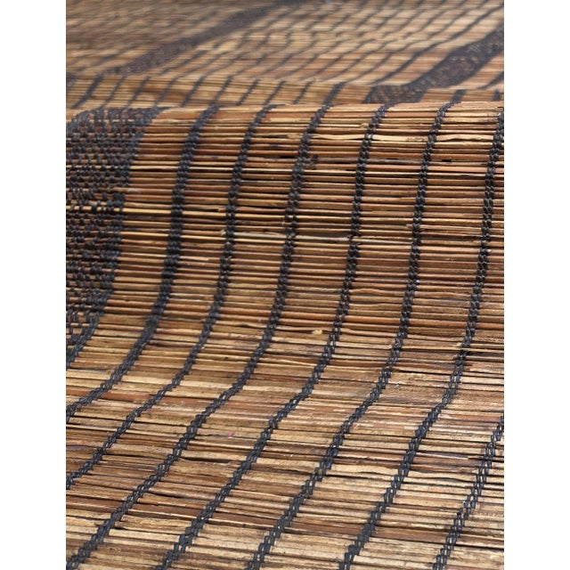 Vintage Tuareg Mat – Handmade Saharan Reed Floor Mat This authentic vintage Tuareg mat features a beautiful natural tan...