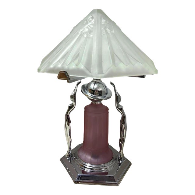 Beautiful Art Deco style chrome lady lamp with heavy frosted glass shade, featuring two nude female sculptures along the...