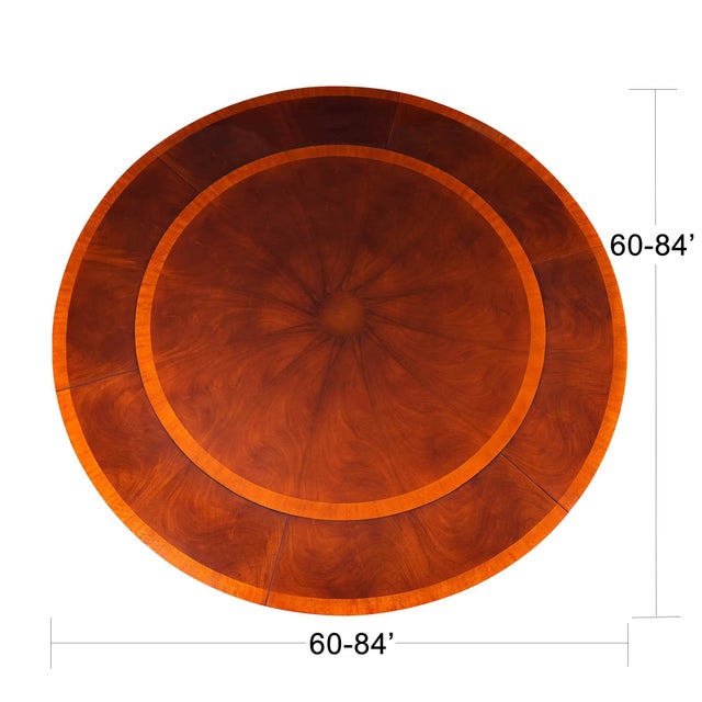 The Niagara Furniture 84 inch Round Perimeter Table is produced with a figured mahogany field and satinwood banding on the...