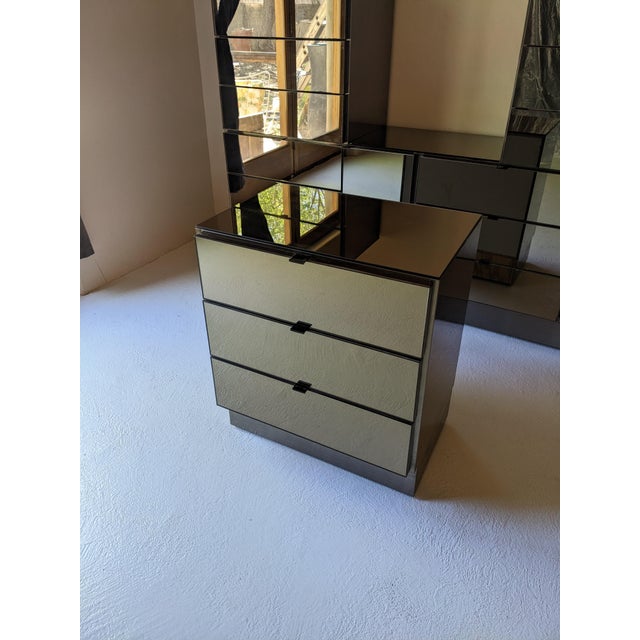 Ello Gunmetal Stainless & Smoked Mirror Three Drawer Night Stand or Cabinet. The drawers and top are mirrored and the...