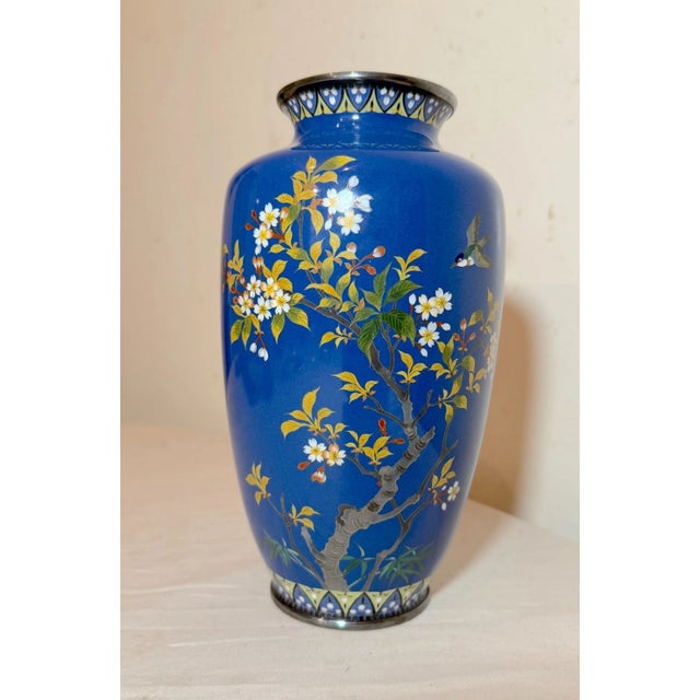 This fine antique sterling silver mounted Japanese enameled blue cloisonne vase is a beautiful piece originating from...