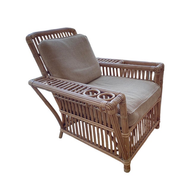 2 Palecek President's Chairs and 2 matching Ottomans. As described by Palecek -- "multiple pencil pole rattan wrapped...