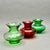 Vintage trio of MCM Anchor Hocking red and green glass vases. They are squat vases with ruffled rim. They measure...