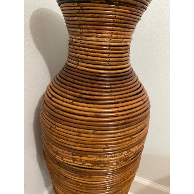 This floor vase is a beautiful example of pencil reed in the Crespi style. It stands 31” tall and the graceful shape looks...