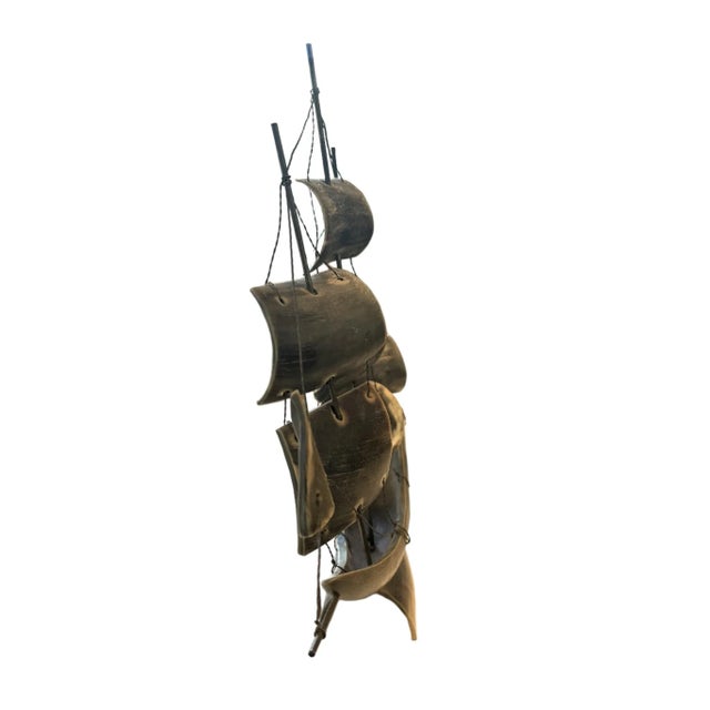 A unique mid-century ship or sailboat accessory, hand-crafted out of carved horn. It has a sleek curvy shape and the...