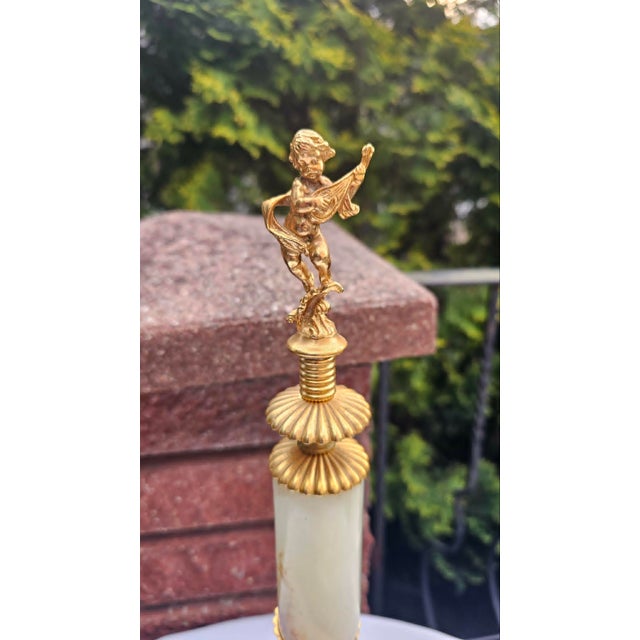 Onyx column, brass, angel, 1950s, dimensions: height: 44 cm, diameter: 17 cm.