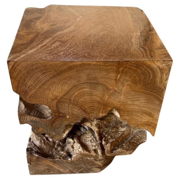 A century old teak block is repurposed into this one of a kind side table whilst respecting the natural organic wood. We...