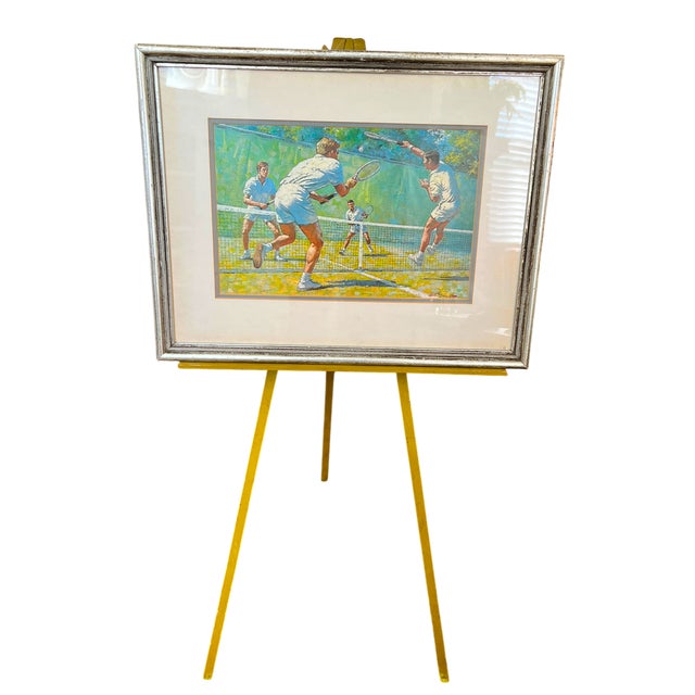 A charming vintage wooden artist’s easel painted in a vibrant chartreuse yellow-green finish. Its simple tripod...