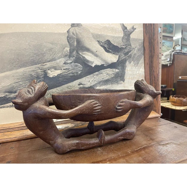 Possibly African Origin. Two Creature Figurines Wrap around the Bowl. Nice aging to the Wood creating a Gorgeous Patina....