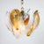 This Postmodern Murano glass light fixture by La Murrina features two tiers of cristallo glass shells with amber and white...