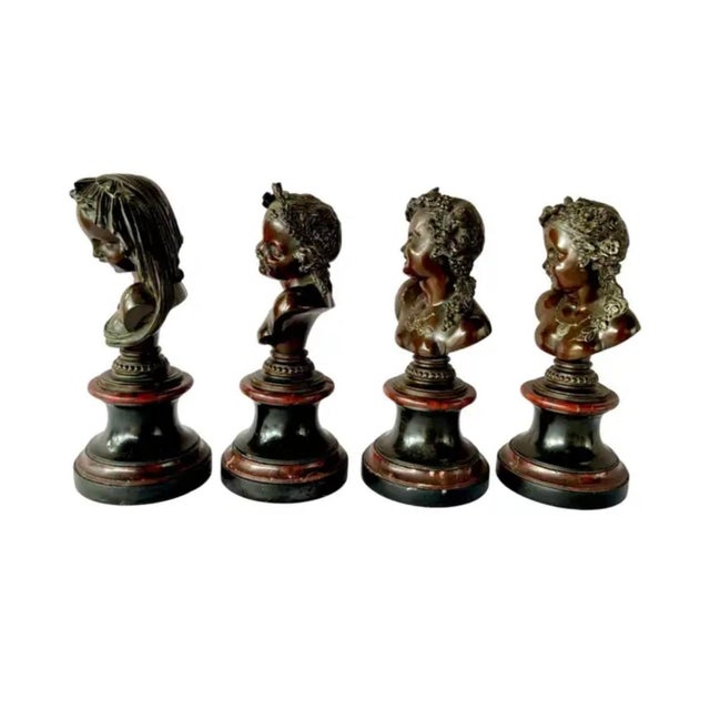 Set of Four Bronze Female Allegorical Busts on Marble Plinths. This is an elegant set of four bronze female neoclassical...