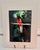 Striking signed wildlife photograph of a Resplendent Quetzal by noted nature photographer Michael Fogden, photographed at...