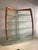 Italian Cherry Wood Wall Unit with Lacquered Back Panel and Glass Shelves, 1980s, in Good conditions. Designed 1980 to 1989