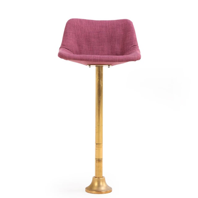 A stylish set of five rotating bar stools dating to circa 1960, distinguished by their sculptural mid-century form and...