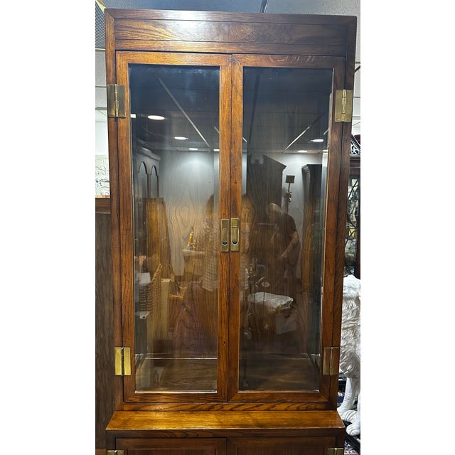 Henredon “Scene One” vintage oak curio cabinet . Upper cabinet has glass doors and three glass shelves with plate rails....