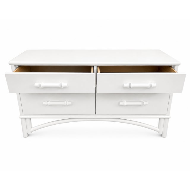 This beautifully refinished Whitecraft vintage low dresser. Crafted with clean mid-century lines and distinctive bamboo...