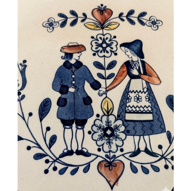Bring a touch of timeless, storybook charm to your table with this delightful vintage serving platter from Johnson Bros....