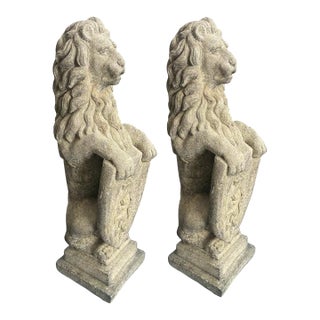 1990s Stately Pair of Cast Stone Seated Lion Statues With Heraldic Shields For Sale