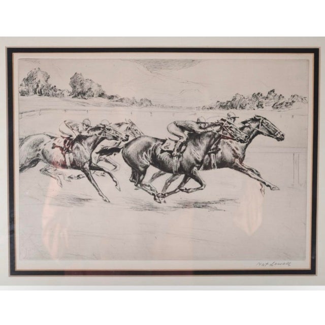 An original early 20th-century horse racing etching by Latvian-American artist Nat Lowell (1880–1956). Lowell captures the...
