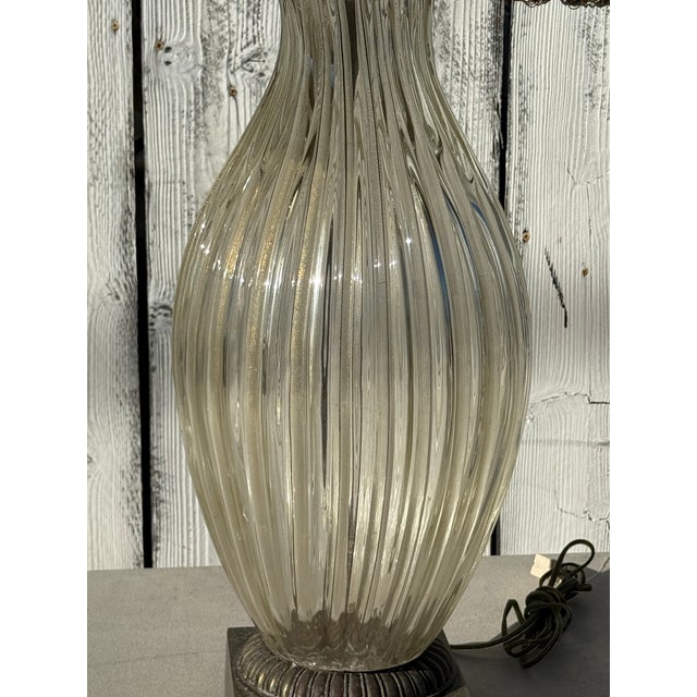 Exceptional Large Murano Glass Table Lamp with Custom Velvet Shade with fringe trim. Mid-20th Century This stunning...