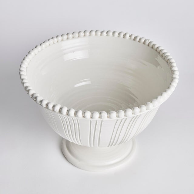 The Perla Decorative Footed Bowl is handmade by Italian artisans in Tuscany, Italy. The graceful ribbing and hand-applied...